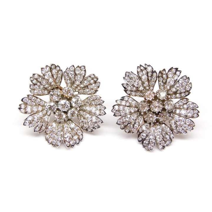 Pair of 19th century large diamond flowerhead clusters, later fitted as earrings